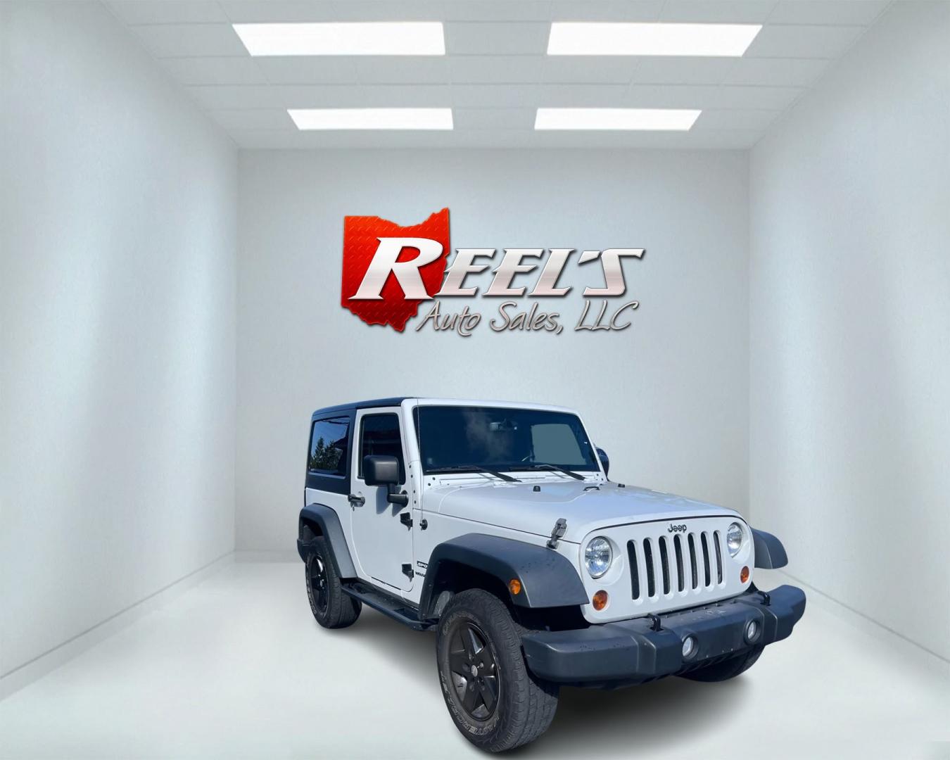 2013 White /Black Jeep Wrangler Sport 4WD (1C4AJWAG7DL) with an 3.6L V6 DOHC 24V engine, 6 Speed Manual transmission, located at 11115 Chardon Rd. , Chardon, OH, 44024, (440) 214-9705, 41.580246, -81.241943 - Photo#2